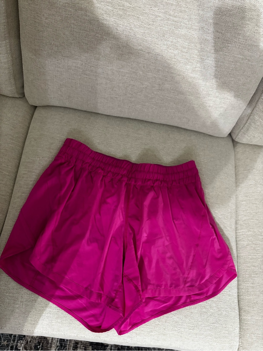 Two pairs of Lululemon track that Mid rise 5 inch short